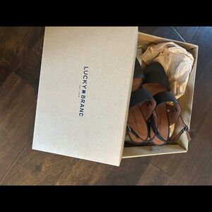 New Lucky Brand black leather sandals with box size 8.5. Cushion bed.